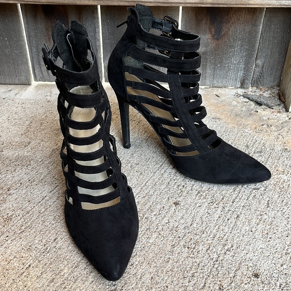 Guess closed toe strappy heels.
